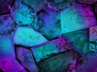 gradient rough rock weathered wall texture use as background in turquoise and purple color tone. abstract solid wall background. the wall of stone for fantasy design. old crystal background.