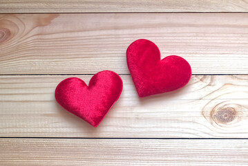 Couple Red Hearts on wood background