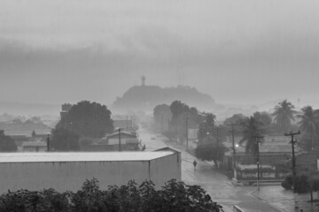 Oeiras, Brazil - Circa February 2021: A rainy day in Oeiras, morro do Leme in the background. Black...