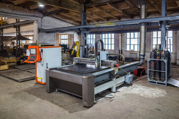 CNC laser cutting machine for sheet metal in the production area. The picture was taken in Russia,...