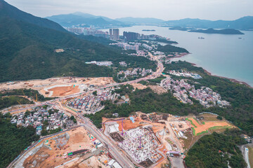 Naklejka premium Wide angle aerial shot of the Tseng Tau Tsuen Sai Kung and the nearby construction site