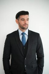 Elegant young Caucasian handsome man on White background, Studio fashion portrait.