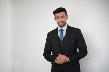Elegant young Caucasian handsome man on White background, Studio fashion portrait.