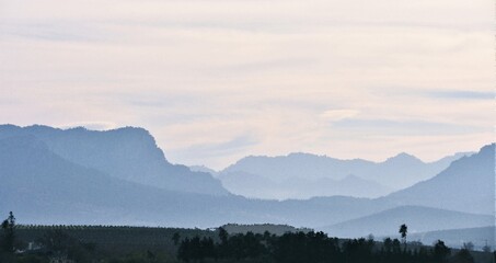 Landscape with the Hottentots Holland Mountains in the Cape Winelands Impression