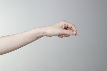 Cropped image of woman hand holding gesture