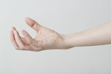 Cropped image of woman hand holding gesture