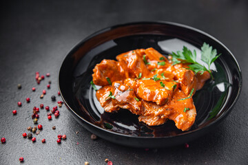 stewed meat tomato sauce pork beef chicken fresh dietary healthy meal food diet snack on the table copy space food background 