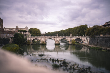 Fototapeta na wymiar Classic roman bridge in Rome
