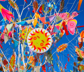 Decorations at Shrovetide, birds, garlands and sun, russian Maslenitsa