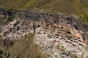 Vardzia cave monastery complex in Georgia monument of medieval Georgian architecture aerial view....