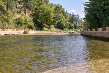 Not a deep forest river in Turkey on a hot summer day.