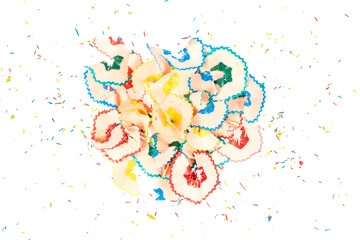 Bunch of colored pencil shavings with colorful graphite crumbs isolated on a white background. close-up