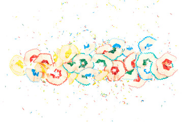 Bunch of colored pencil shavings with colorful graphite crumbs isolated on a white background. close-up