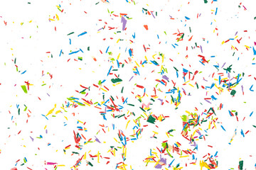 Colorful crumbs of graphite from colored pencils isolated on a white background. colored dust...