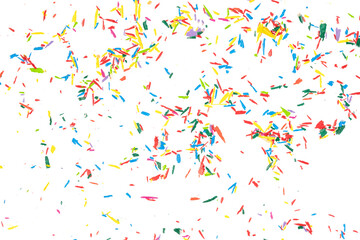 Colorful crumbs of graphite from colored pencils isolated on a white background. colored dust texture close-up