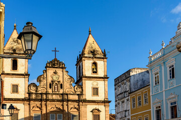 Facade of old and historic churches and houses in colonial and baroque style in the tourist center of Pelourinho, city of Salvador, Bahia