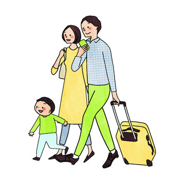 スーツケースを引く家族
