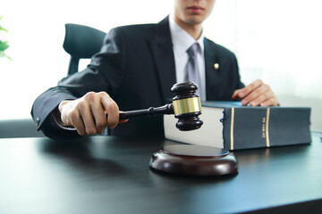 Justice lawyer holding judge gavel, Businessman in suit or lawyer, Advice and Legal services Concept.