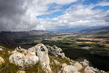 View over the Koo valley near Montagu in South Africa with a storm rolling in over the mountains