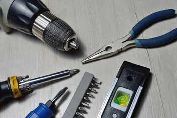 a working tool for minor repairs is laid out on the table