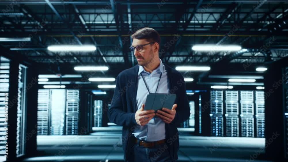 Fototapete Successful Data Center IT Specialist Using Tablet Computer. Server Farm Cloud Computing Facility with System Administrator Working. Data Protection Engineering Network for Cyber Security.