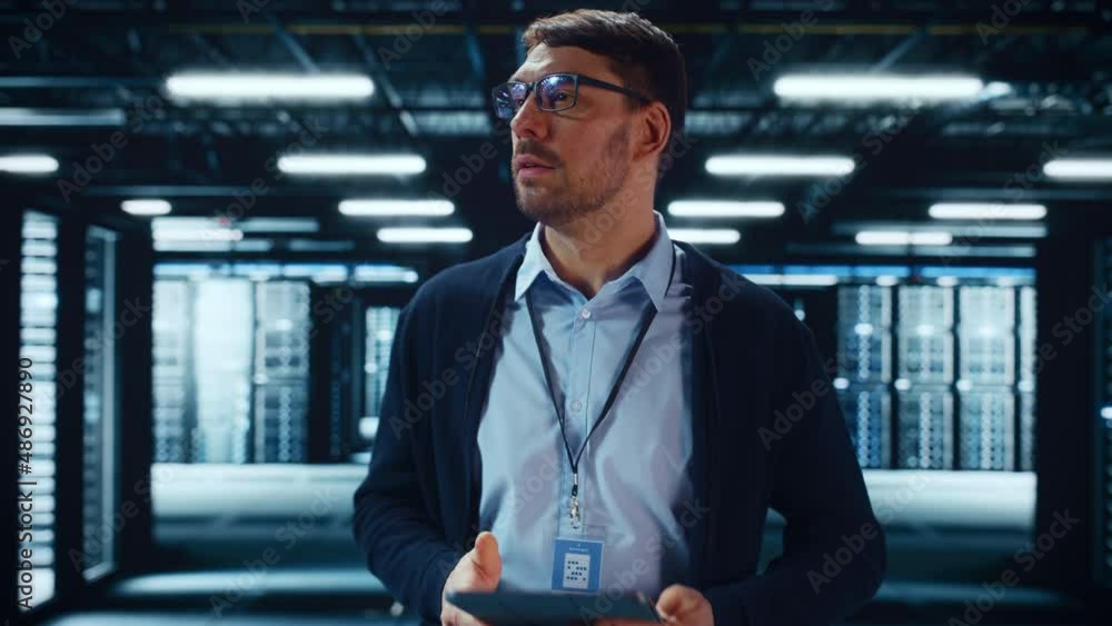 Aufkleber Male IT Specialist Walks Between Row of Operational Server Racks in Data Center. Engineer Uses Tablet Computer for Maintenance and Diagnostics in Cyber Security and Data Protection Facility.