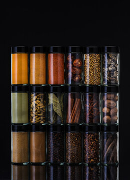 Spices in glass jars..   Spicy and .seasonings. Food and cooking background.