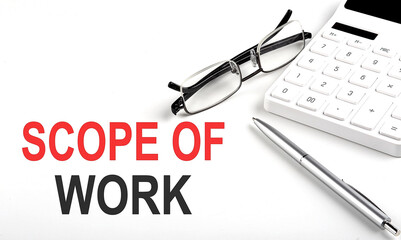 SCOPE OF WORK Concept. Calculator,pen and glasses on the white background