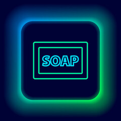 Glowing neon line Bar of soap with foam icon isolated on black background. Soap bar with bubbles. Colorful outline concept. Vector