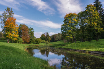 Slavyanka River in the Pavlovsk Palace and Park Complex on a sunny day, Pavlovsk, Saint Petersburg, Russia