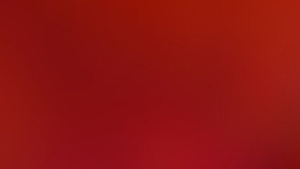 An abstract gradient blurred red background.