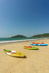 Vibrant colored Kayaks displayed on Palolem beach of South Goa. Palolem beach is one of the cleanest beaches of India.