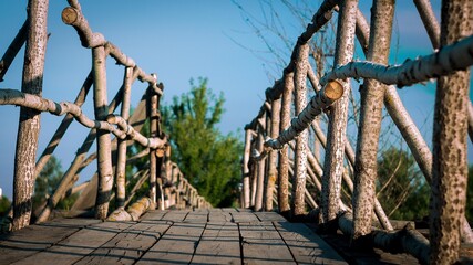 Antique wooden bridge, handcrafted from raw wood