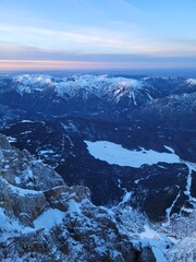 Aerial view on a frozen mountain lake in the alps. View from the top of germany.