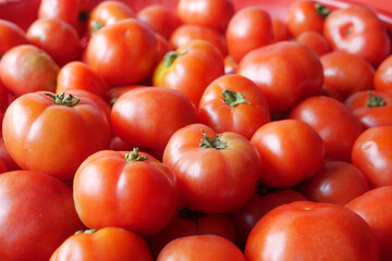 fresh tomato with water drop close up 