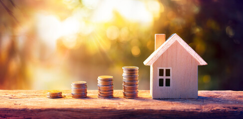 House and Money Coins - Loan Mortgage Concepts - Real Estate