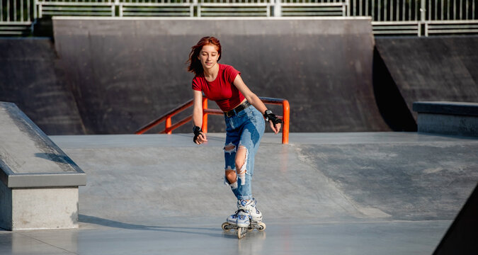 Girl with roller skates outdoors