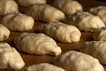 The dough is placed on a baking sheet in the oven