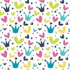 Seamless background with crowns and hearts.