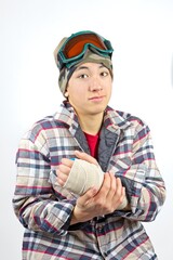 Expression of teen after snowboarding injury.