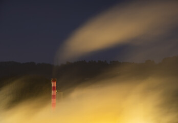 fumes coming out of the chimney at night