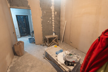 Fototapeta na wymiar Home renovation in room full of painting tools