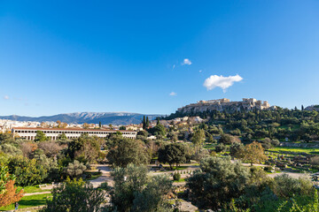 Panorama of the Acropolis. Ancient Greek Parthenon on Acropolis hill is a top landmark of Athens. Scenery of the famous monuments in the Athens center in summer. Landscape with ruins