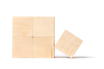Eco-friendly constructor made of natural wooden blocks of cubic shape. Isolate on a white background