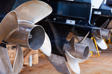 Propellers of motors for motor yachts and boats close-up.