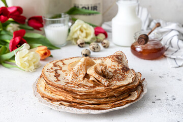 Stack of traditional russian pancakes blini on wooden background. Maslenitsa traditional Russian...