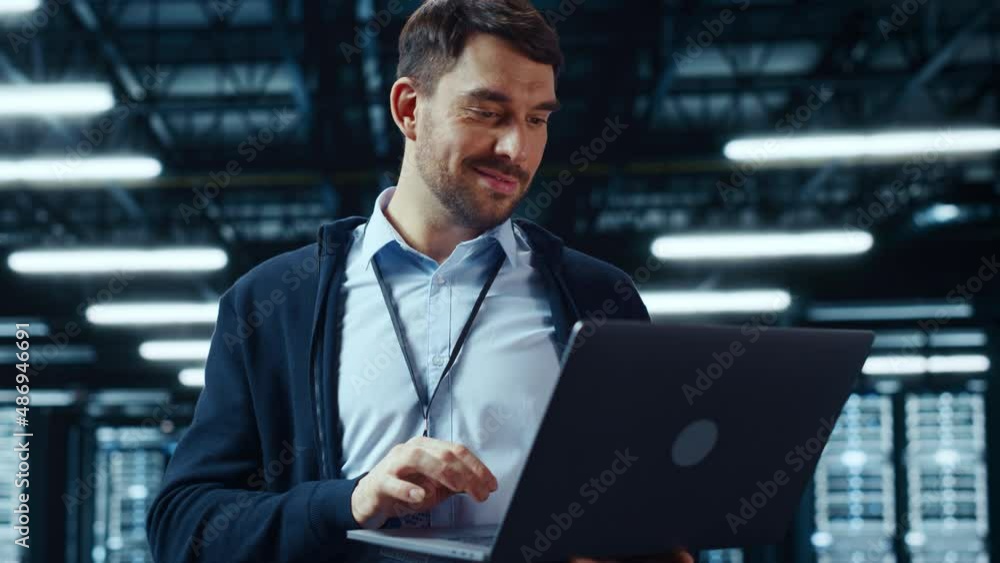 Leinwandbilder Successful Data Center IT Specialist Using Laptop Computer. Server Farm Cloud Computing Facility with System Administrator Working. Data Protection Engineering Network for Cyber Security.