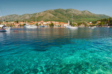 Fototapeta premium Beautiful view of Cavtat town with yachts and boats on Adriatic sea, Dalmatia, Croatia. Summer vacation concept