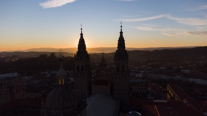 silhouette of the towers of the cathedral of Santiago de Compostela at sunset
