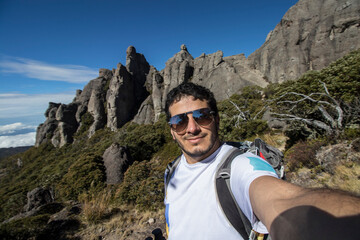 man taking a selfie with background of paramo vegetation in Chirripo National Park